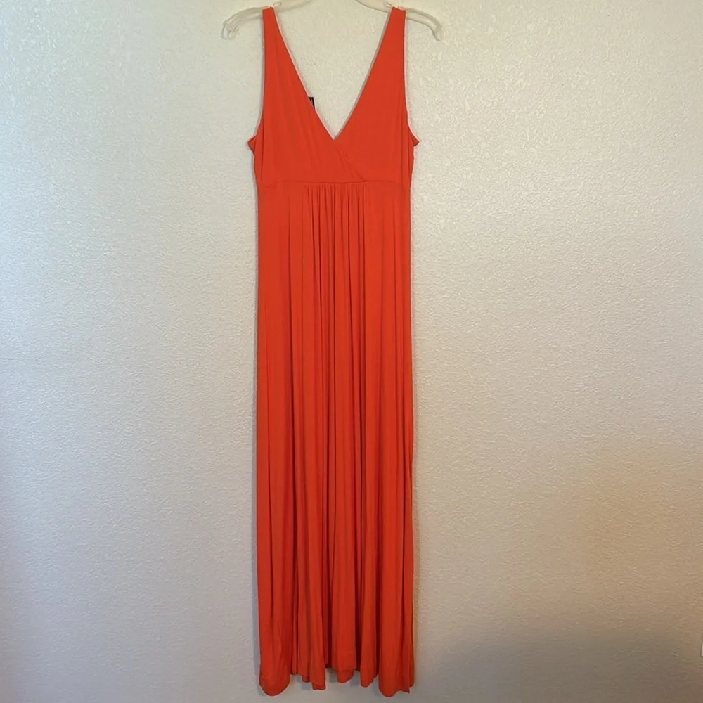 Women’s New York and Co orange maxi dress size XS.